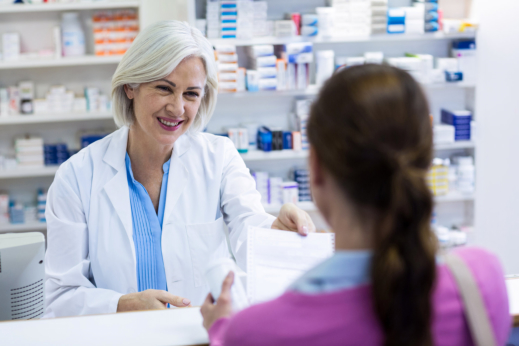 image of the pharmacist give tips to the customer