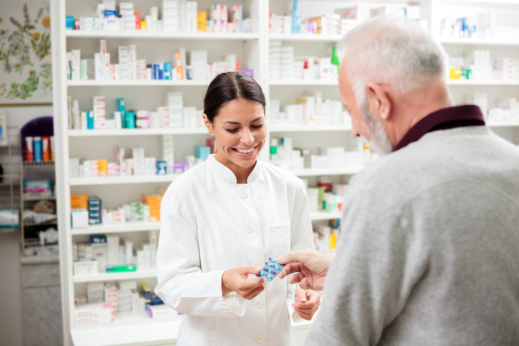 image of the pharmacist and the senior man customer